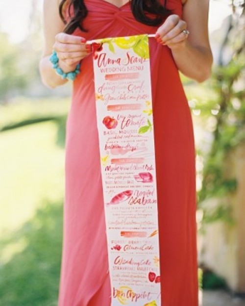 a long menu with colorful touches is a creative and fun idea for a bright summer wedding