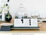 a minimalist black and white wedding menu is chic for a modern or minimalist