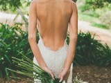 a beautiful lace mermaid wedding dress with a low back on spaghetti straps is a perfect idea for a summer boho wedding