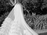 a bold A-line wedding dress with a lace embellished bodice and a layered tulle skirt with ruffles for a refined bridal look