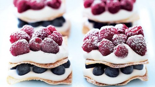 millefoglie with whipped cream and fresh blueberries and raspberries for any wedding, delicious and adorable
