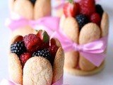 cookie cups filled with fresh rapsberries and blackberries are creative and delicious desserts for any wedding