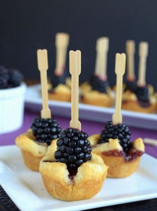 mini pastry cups with berry compote inside and blackberries on top are amazing for a fall wedding