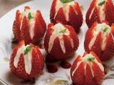 fresh strawberries filled with whipped cream are delicious and easy desserts for a spring or summer wedding