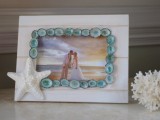your photo in a beach frame decorated with starfish and little blue shells plus corals