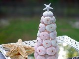 a sea urchin Christmas tree with a star on top plus a starfish for a Christmas beach wedding