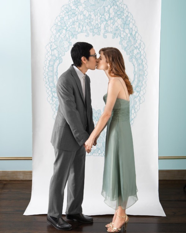 A beautiful handpainted wedding backdrop in pastel blue is a stylish idea and can be DIYed by any of you