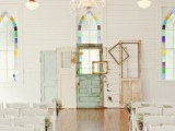 a vintage wedding backdrop composed of several shabby chic doors and frames in different colors is a very relaxed idea