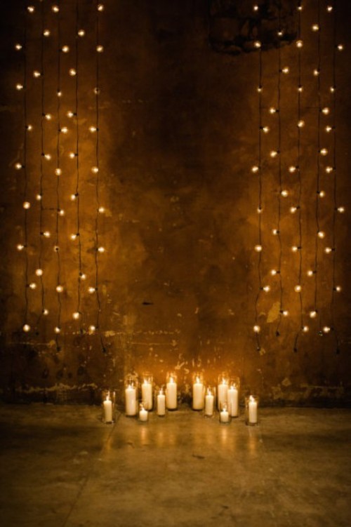 lights hanging down plus some candles on the floor will soften any venue, even the most industrial and rough one