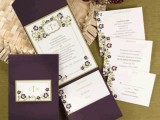 refined deep purple wedding stationery with floral patterns