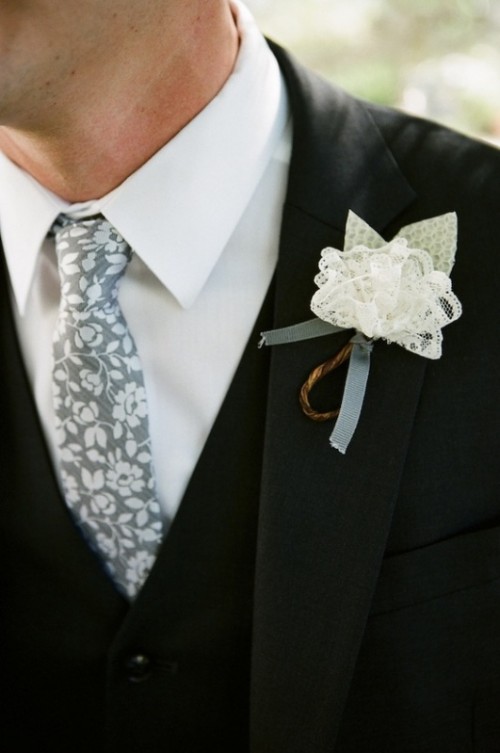 a white lace boutonniere with ribbons and twine is a cool idea to add interest and a vintage feel to the look, a ute DIY alternative to a usual boutonniere