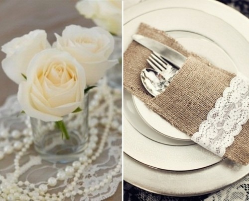 a lace table runner and a burlap utensil pocket detailed with lace are a gorgeous idea for a wedding with a vintage feel