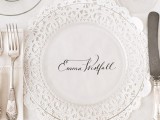 a doily placemat paired with a clear glass plate looks very chic and lovely and gives a refined vintage feel to the table