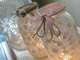 jars with lace inside make up lovely candle lanterns and will give a chic vintage feel to your reception space, you can DIY as many as you need