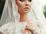 a veil with a lace trim is a traditional accessory for a bride, to add a feminine and very romantic feel to her look