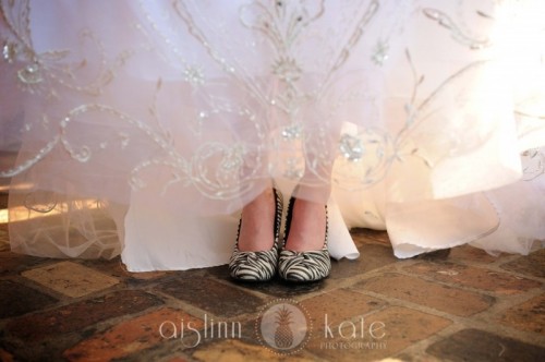 zebra printed wedding shoes is a bold and catchy idea to make your look unique