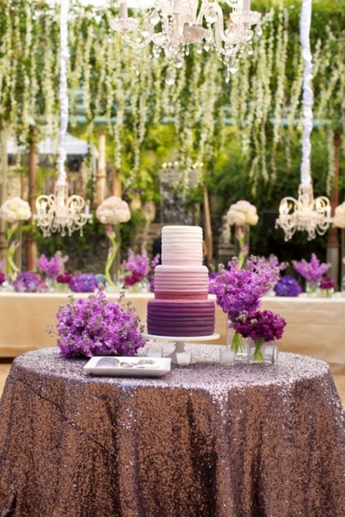 an elegant ombre wedding cake from white to lilac and deep purple is a bold and catchy idea for a summer or fall wedding