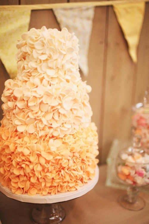 an ombre wedding cake from light tan to yellow and mellow yellow is a lovely idea for a spring or summer wedding, and the texture is cool