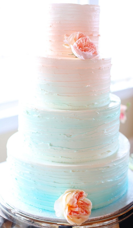 a beautiful pastel ombre wedding cake with light pink and mint tiers, peachy and light pink peonies is a cool idea for spring and summer