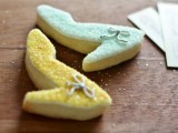 shoe-shaped gold and mint cookies are a fancy idea for a bridal shower or a wedding