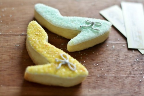 shoe-shaped gold and mint cookies are a fancy idea for a bridal shower or a wedding