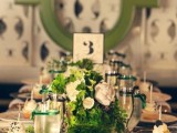emerald and white wedding centerpieces are a cute idea for refreshing your table