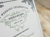 a wedding invite decorated with emerald patterns and calligraphy