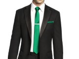 an emerald is a simple way to integrate this bold shade into your groom’s look