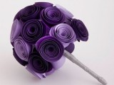 a wedding bouquet of purple and lavender fabric flowers and a neutral wrap will give a bright touch to your look