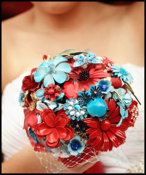 a colorful wedding bouquet in turquoise and red, of brooches and buttons is a very bright and catchy idea