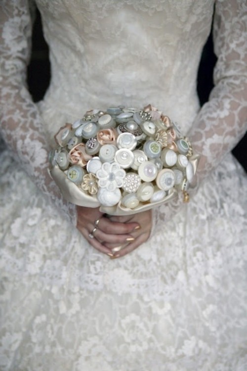 a button wedding bouquet with silk ribbons is a very cool and eco-friendly idea, don't use real blooms at all