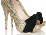 gold glitter platform peep toe shoes with black velvet bows are lovely for a glam bride