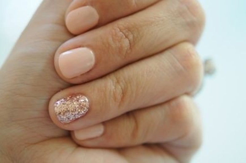 Nude nails with a pink glitter accent one are amazing for a bride who loves nude but wants a bright accent