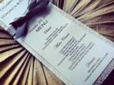 a chic silver glitter frame menu with a grey bow is a very refined and elegant idea for a glam wedding