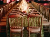 a gold glitter tablecloth is a lovely way to accent a reception table and add a bit of shine to it