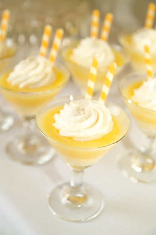 A lemon wedding dessert and drink with some cream on top is a lovely idea for a bold yellow spring wedding