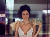 oversized tan tulle bows on your shoulders will accent your wedding dress giving it a light and girlish feel