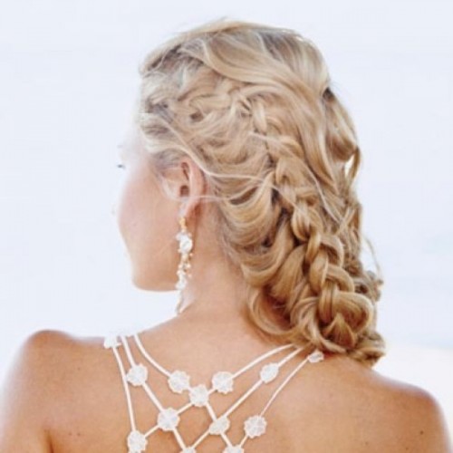 a wavy half updo with several braids is a great idea for long hair, with much dimension and eye-catchiness