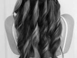 a beautiful wavy half updo with a horizontal braid is a gorgeous idea for medium length or long hair