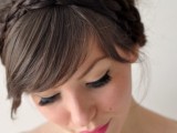 an updo with a dimensional bump, two small braids and bangs is a chic idea with a retro feel
