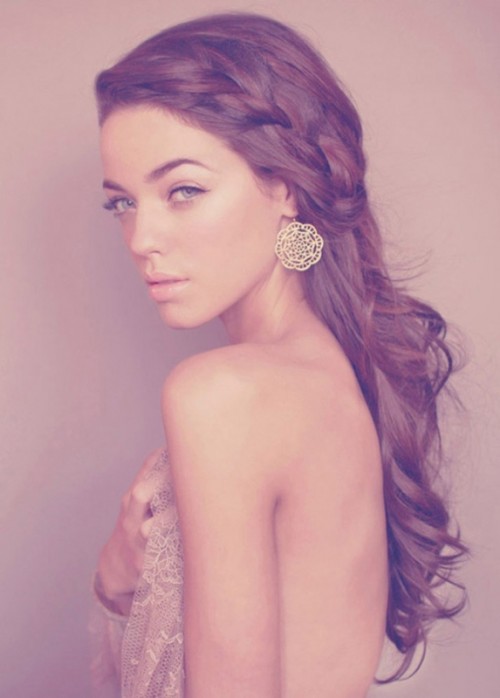 a wavy half updo with a braid on top for long hair is a beautiful idea for brides, bridesmaids and guests