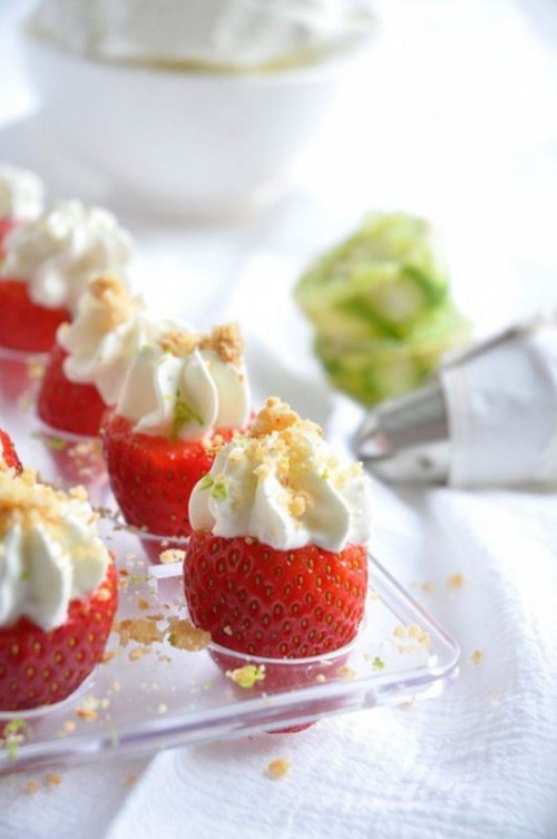 strawberries with whipped cream and nuts on top are a simple sweet finger food idea