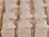 mini cake pops with whipped cream and little cream hearts