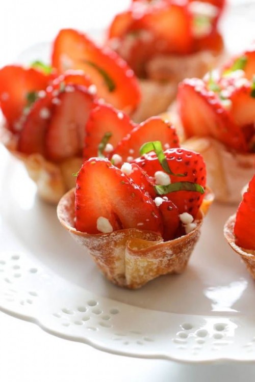 tasty cups with strawberries, herbs and touches of cream cheese