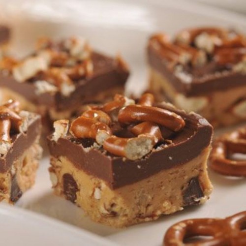 mini fudge pieces with nuts and pretzels on top for more taste