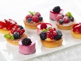 mini cups with cream and fresh berries, mini mousse cakes and jellies