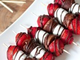 little marshmallow, brownie and strawberry kabobs with fudge sauce