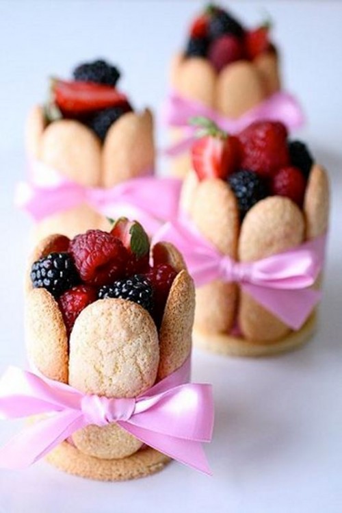cookie cups filled with fresh berries - raspberries and blackberries