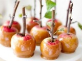 caramelized apples on sticks are a great dessert idea for a fall wedding