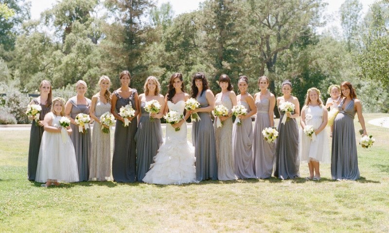 Maxi strapless bridesmaid dresses in all shades of grey are a cool option for many weddings